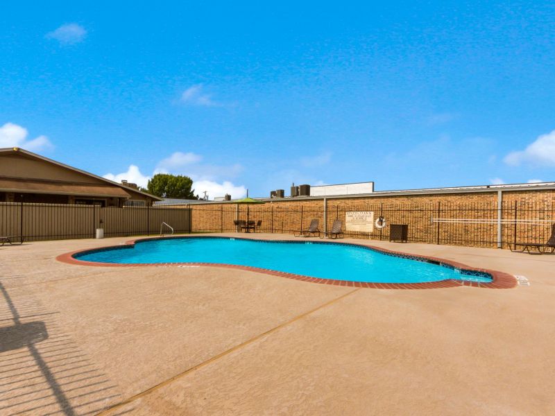 Living Oaks Apartments in Red Oak, TX with sparkling community pool and sun deck